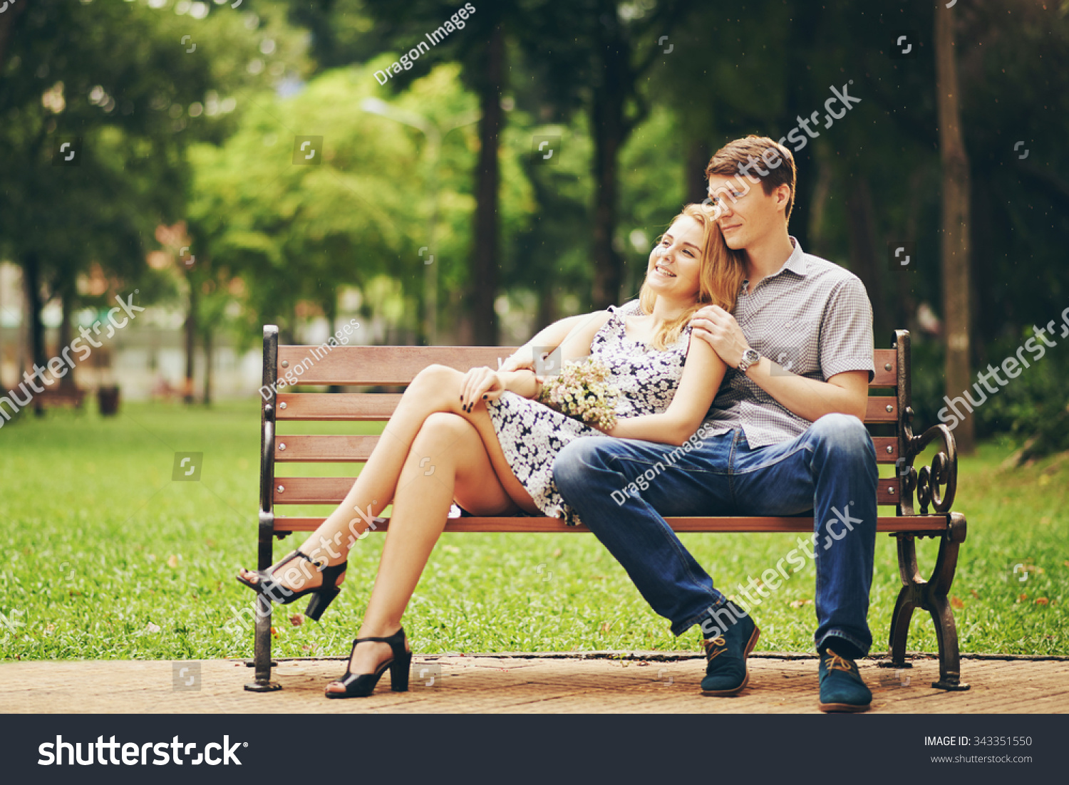 Happy Young Couple Sitting On Bench Stock Photo 343351550 | Shutterstock