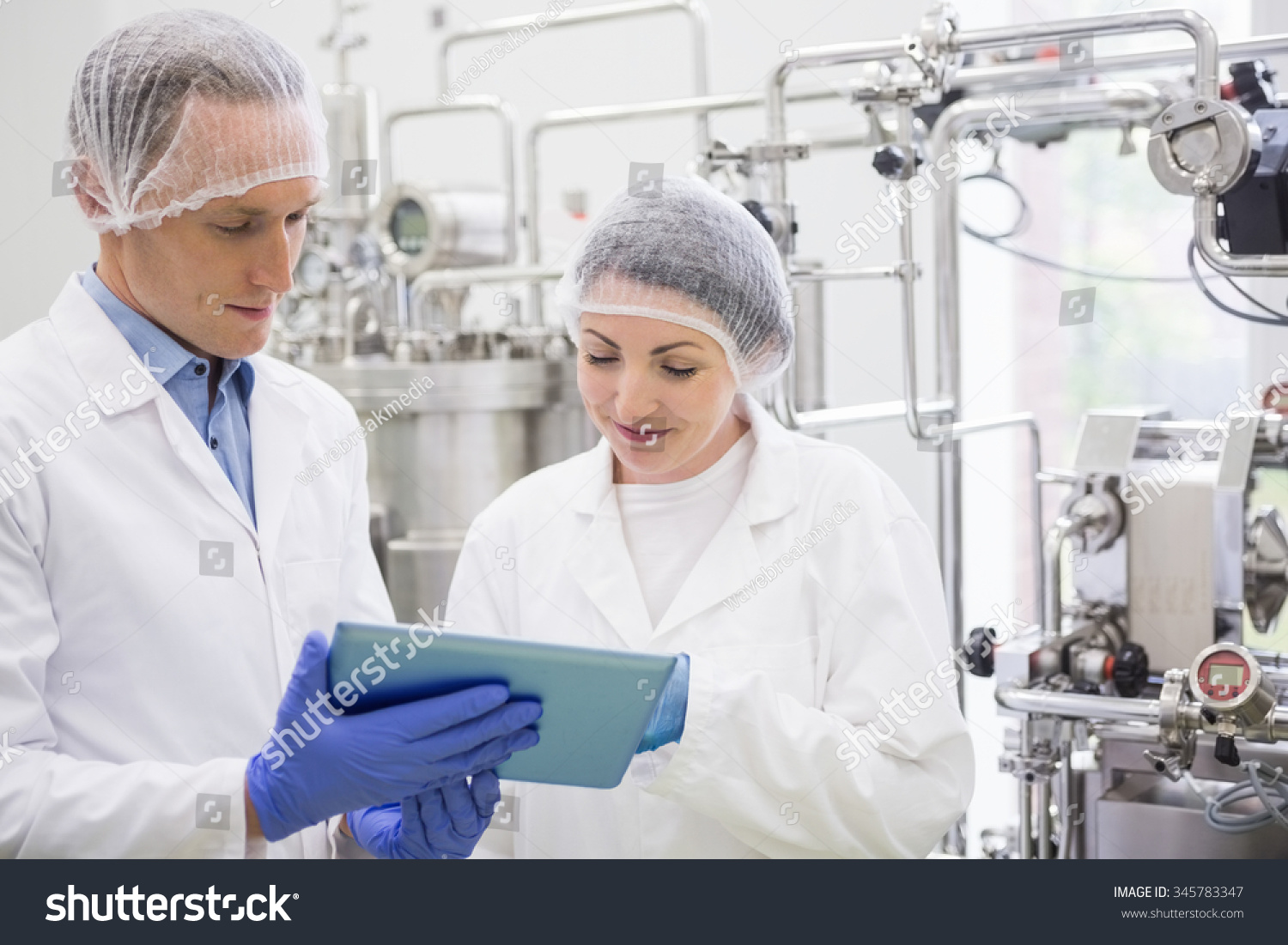 Scientists Using Tablet Control Vats Lab Stock Photo 345783347 