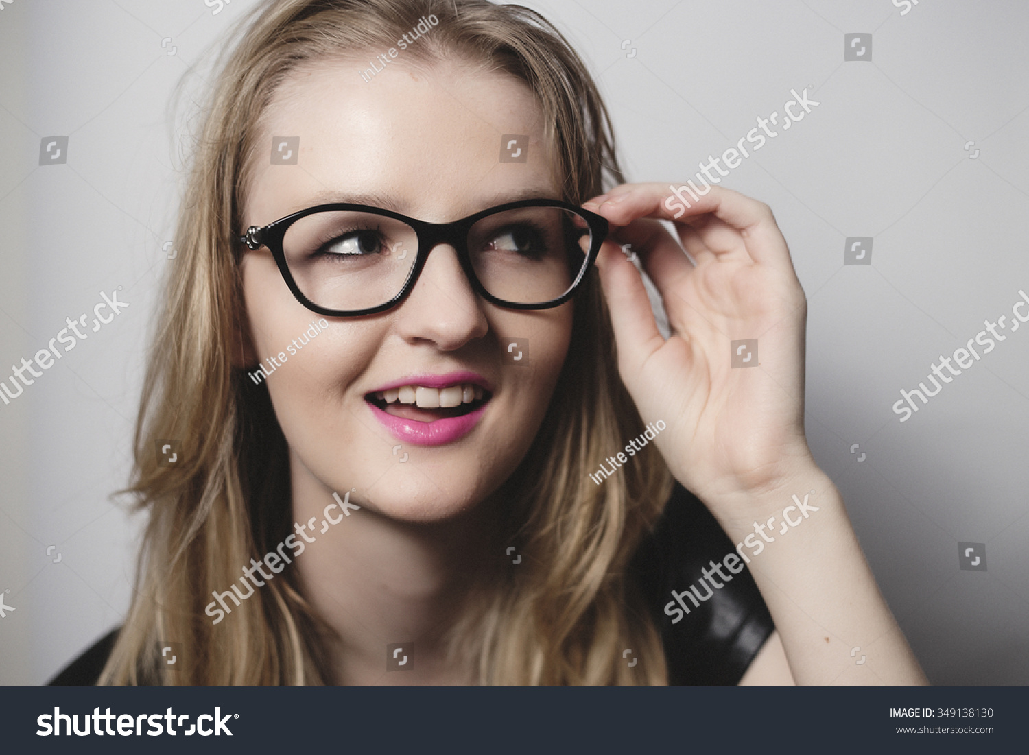 Blonde Girl Holding Glasses Foto Stok 349138130 Shutterstock