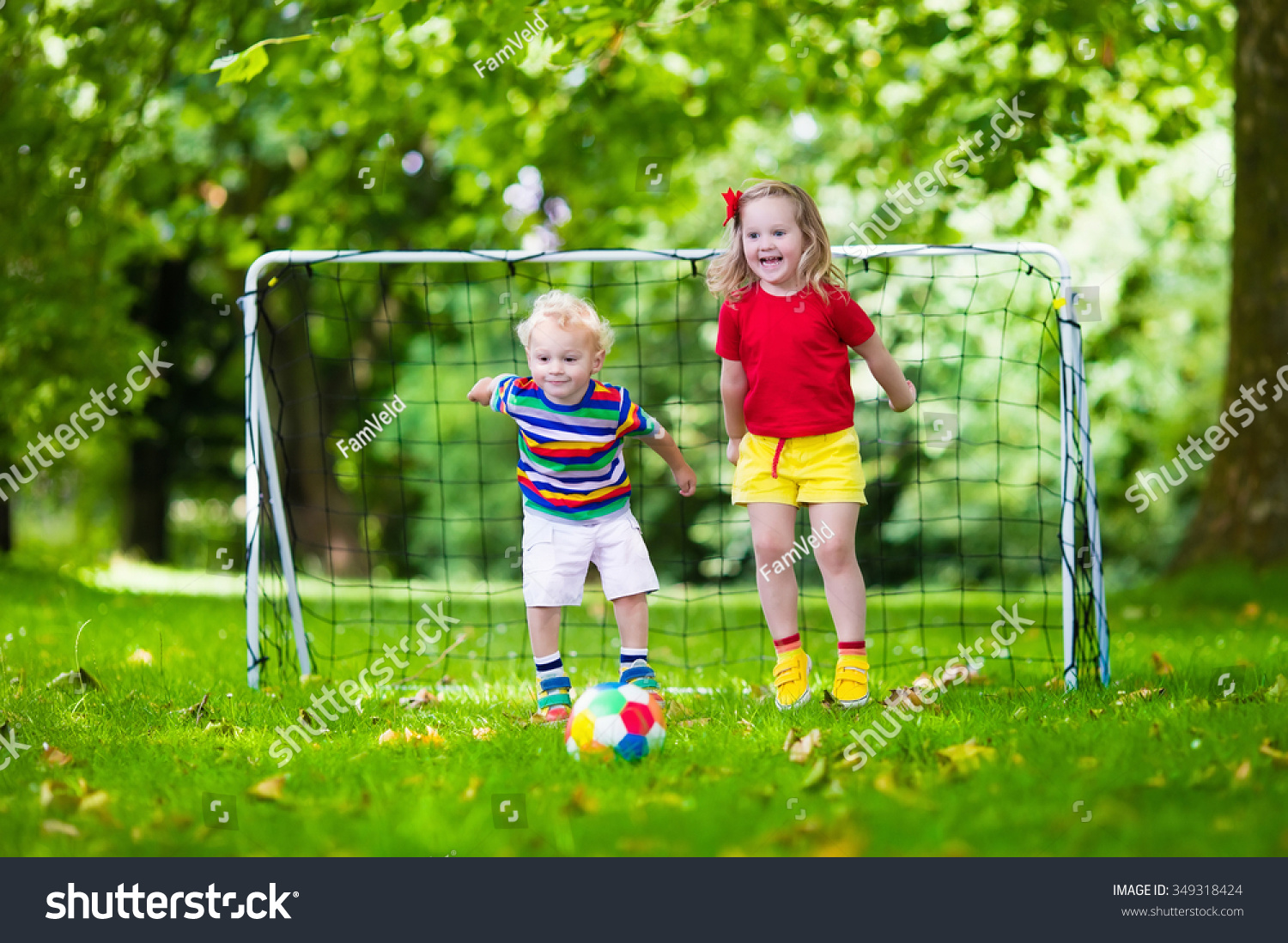 Two Happy Children Playing European Football Stock Photo 349318424 