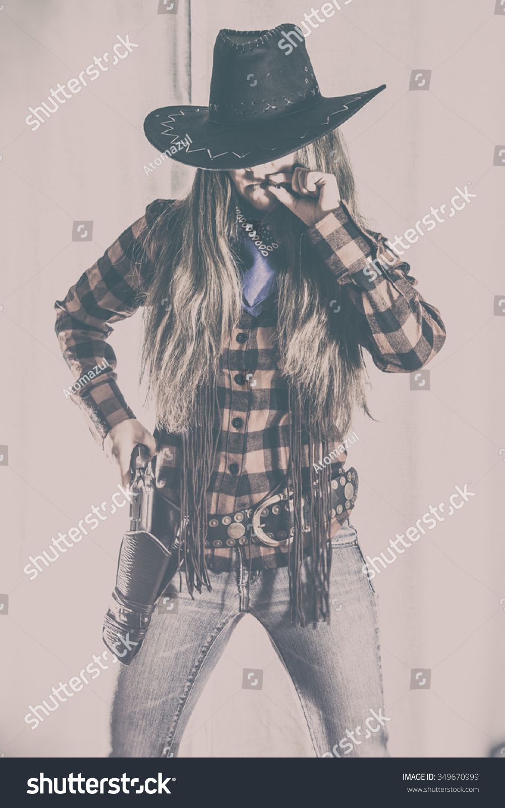 Стоковая фотография 349670999: Cowgirl Gunslinger Western Stance Old West S...