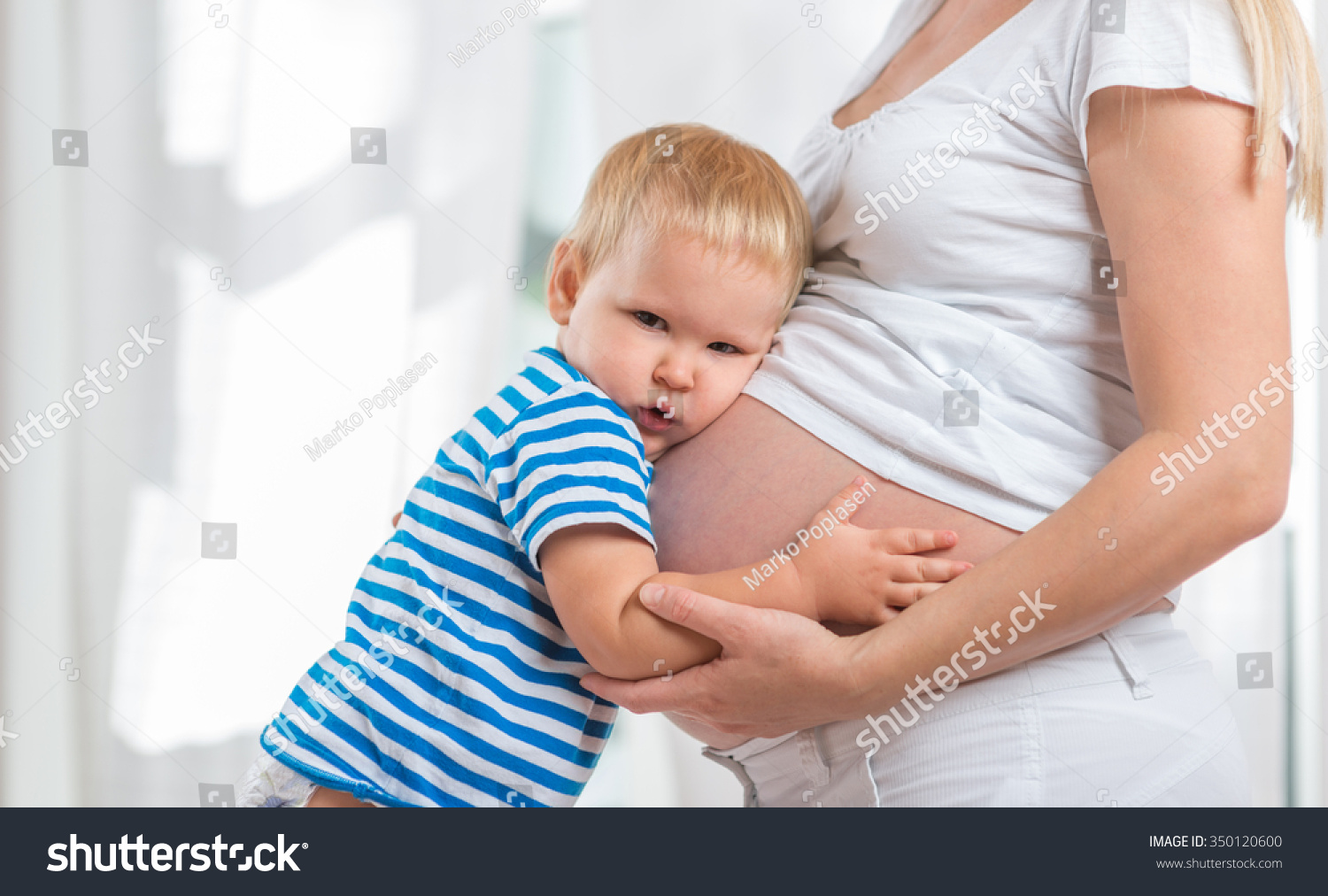 Little Cute Boy Embracing His Pregnant Stock Photo 350120600 | Shutterstock
