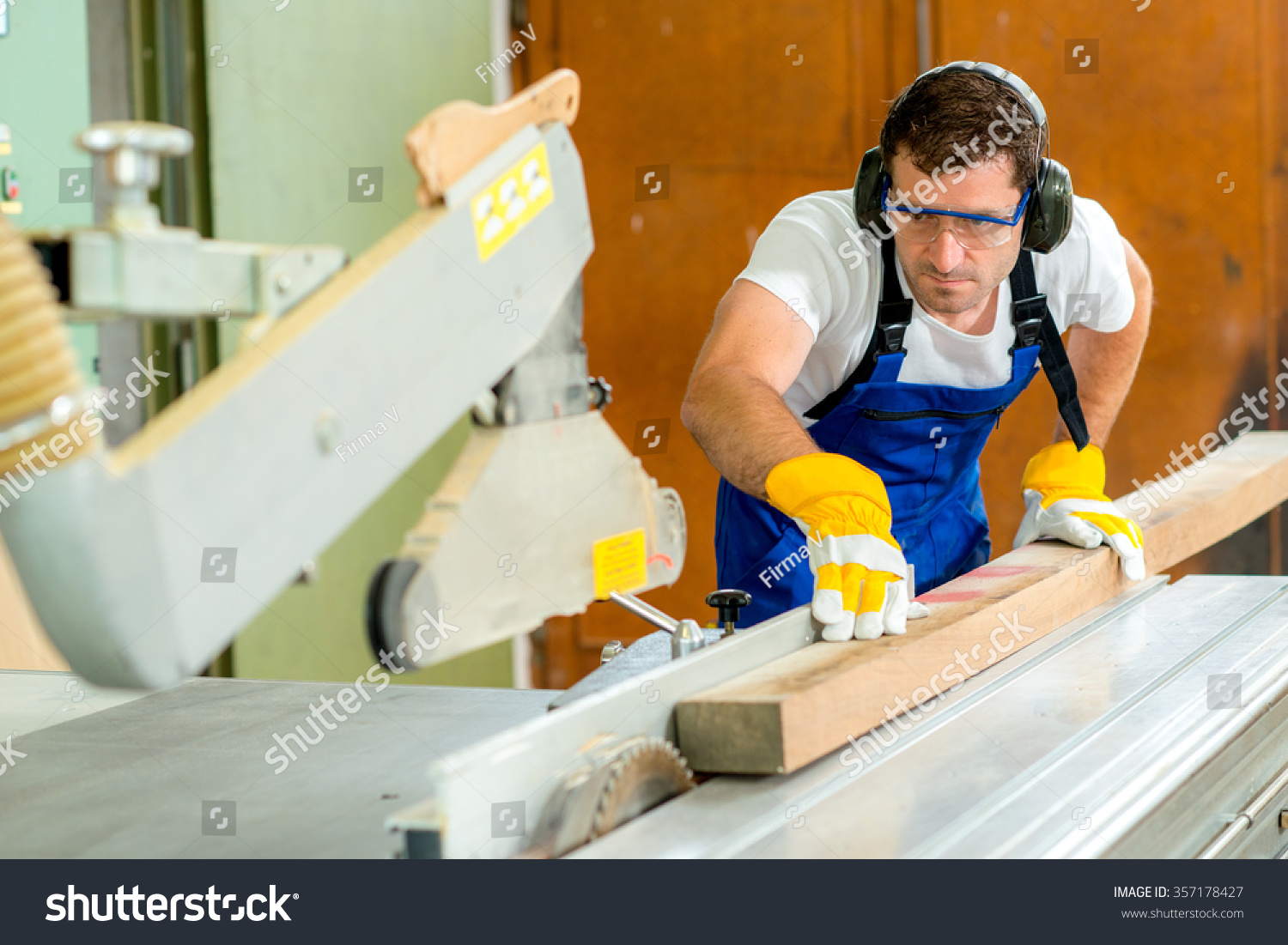 Worker Carpenters Workshop Using Saw Machine Stock Photo 357178427 ...