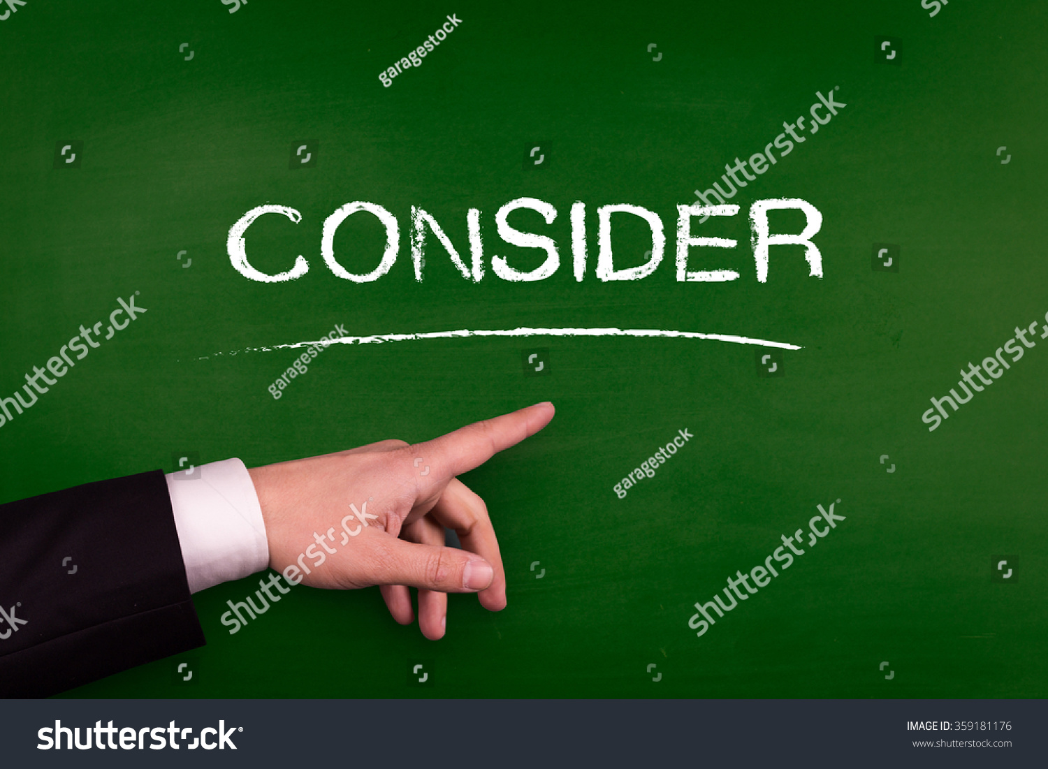 Businessman Pointing Consider Word On Blackboard Stock Photo 359181176 ...