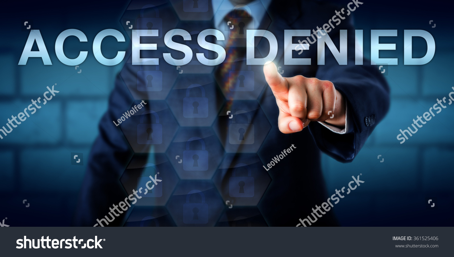 businessman-pointing-phrase-access-denied-on-stock-photo-361525406