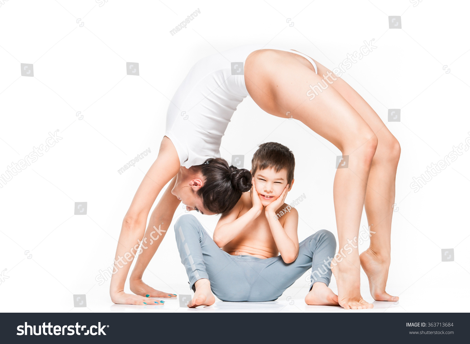 Стоковая фотография 363713684: Mom Doing Yoga Bridge Pose Over Shutterstock...