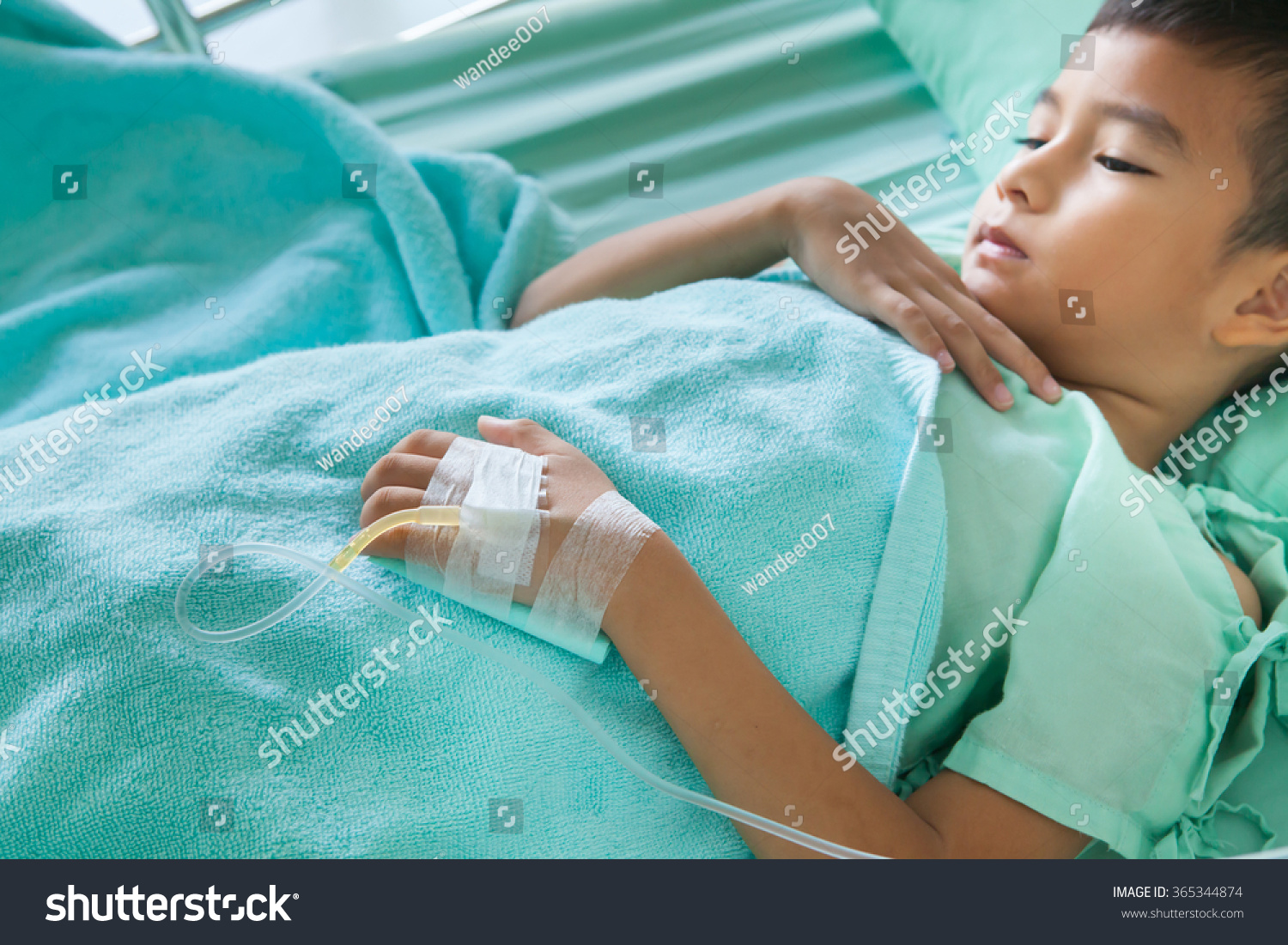 hand-patient-on-bedlittle-boy-sick-stock-photo-365344874-shutterstock