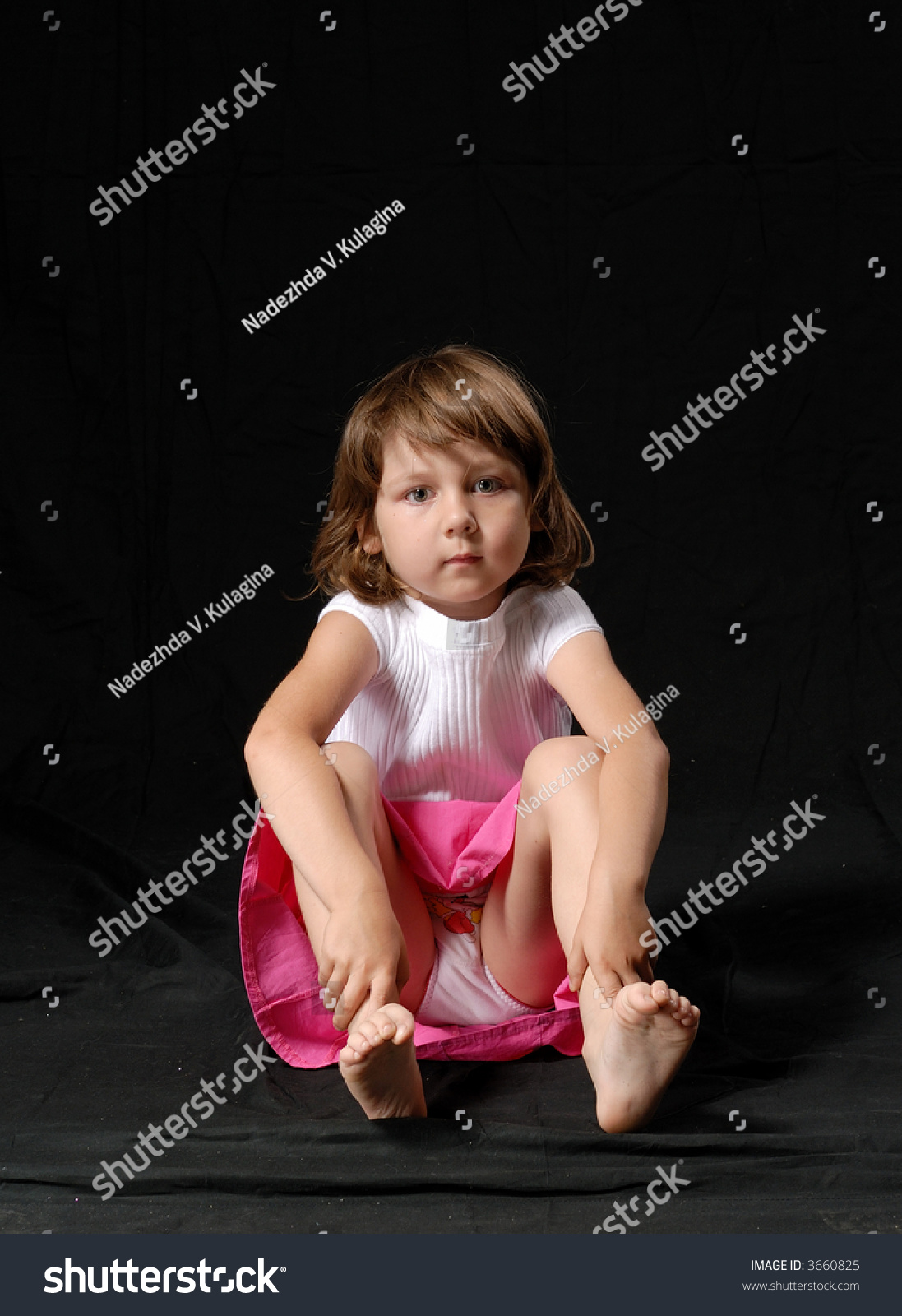 little girl skirt sitting