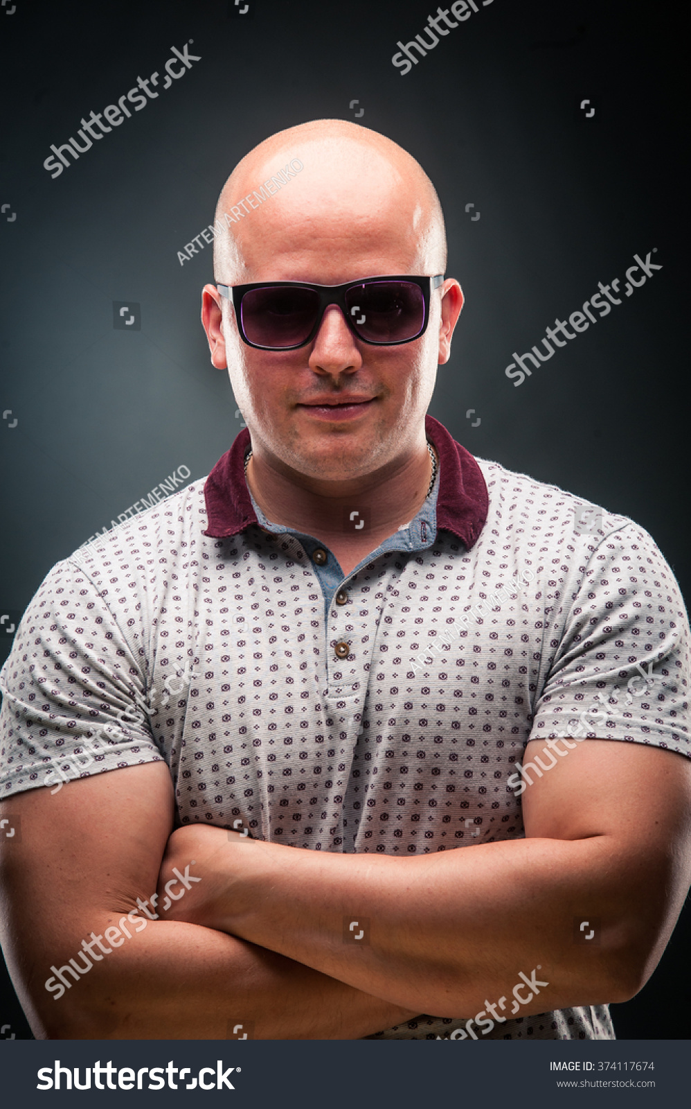 bald man with sunglasses