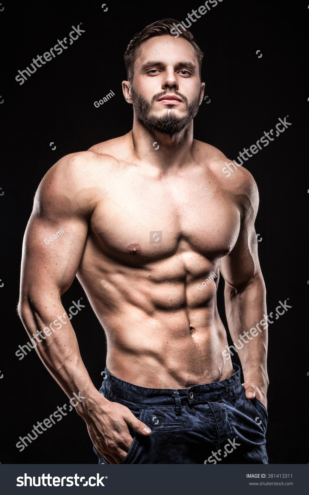 Attractive Bodybuilder Sportsman Shows Perfect Body Stock Photo ...