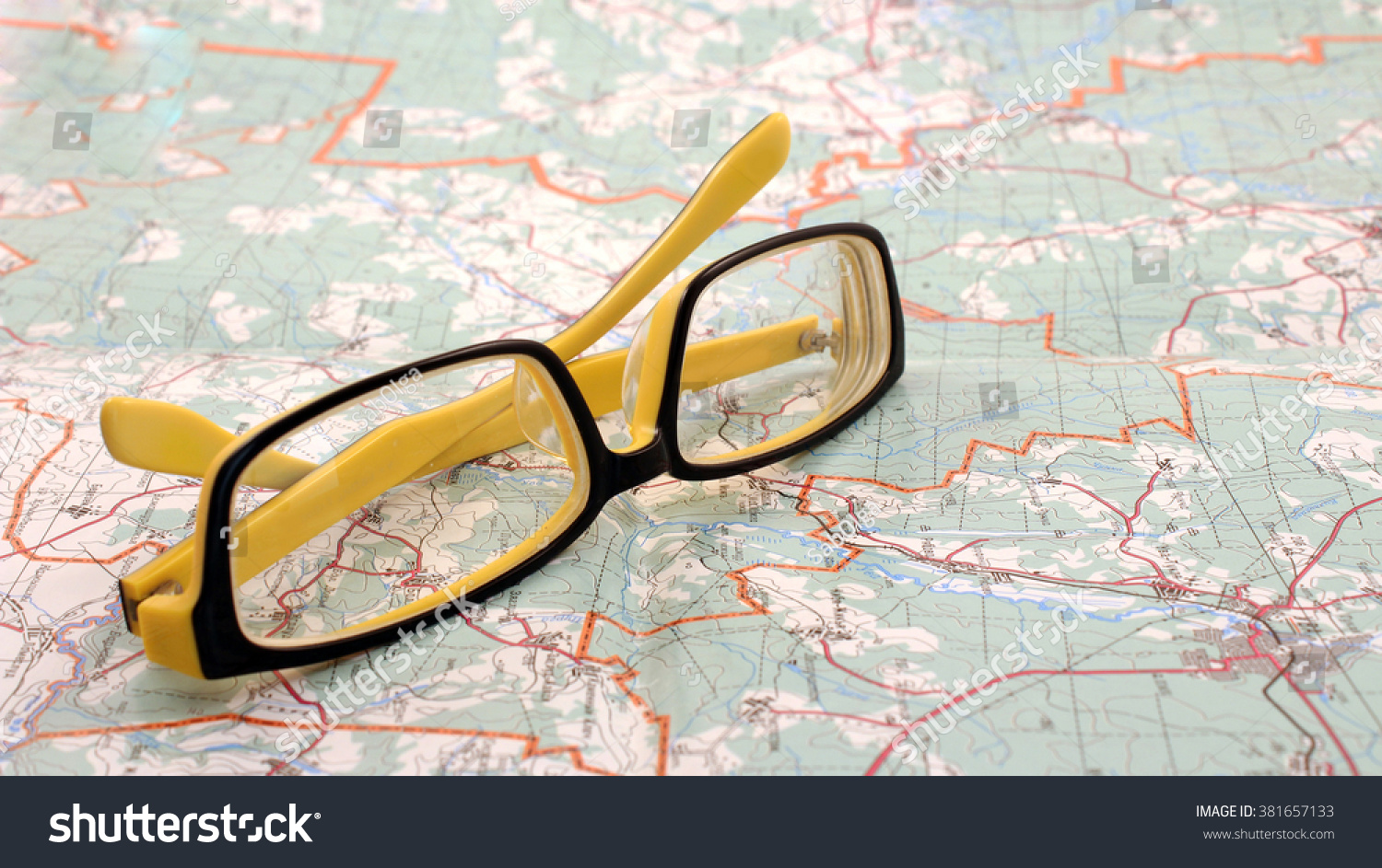 Stock Photo Eyeglasses And Map 381657133 