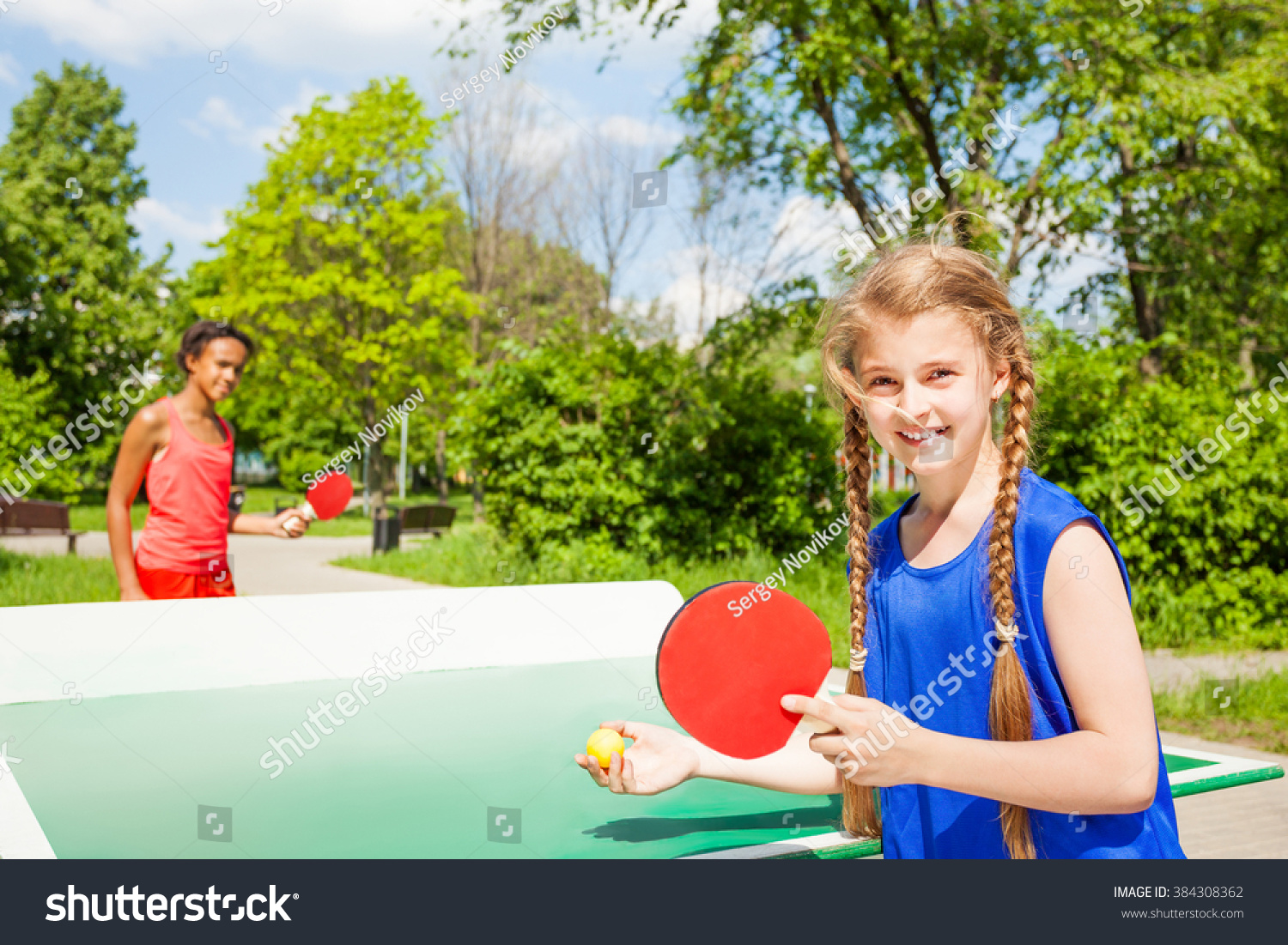 Two Happy Girls Playing Ping Pong Stock Photo 384308362 | Shutterstock