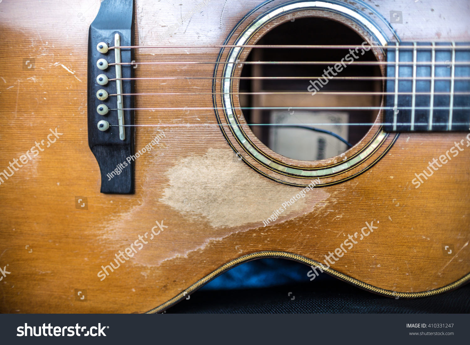 relic an acoustic guitar