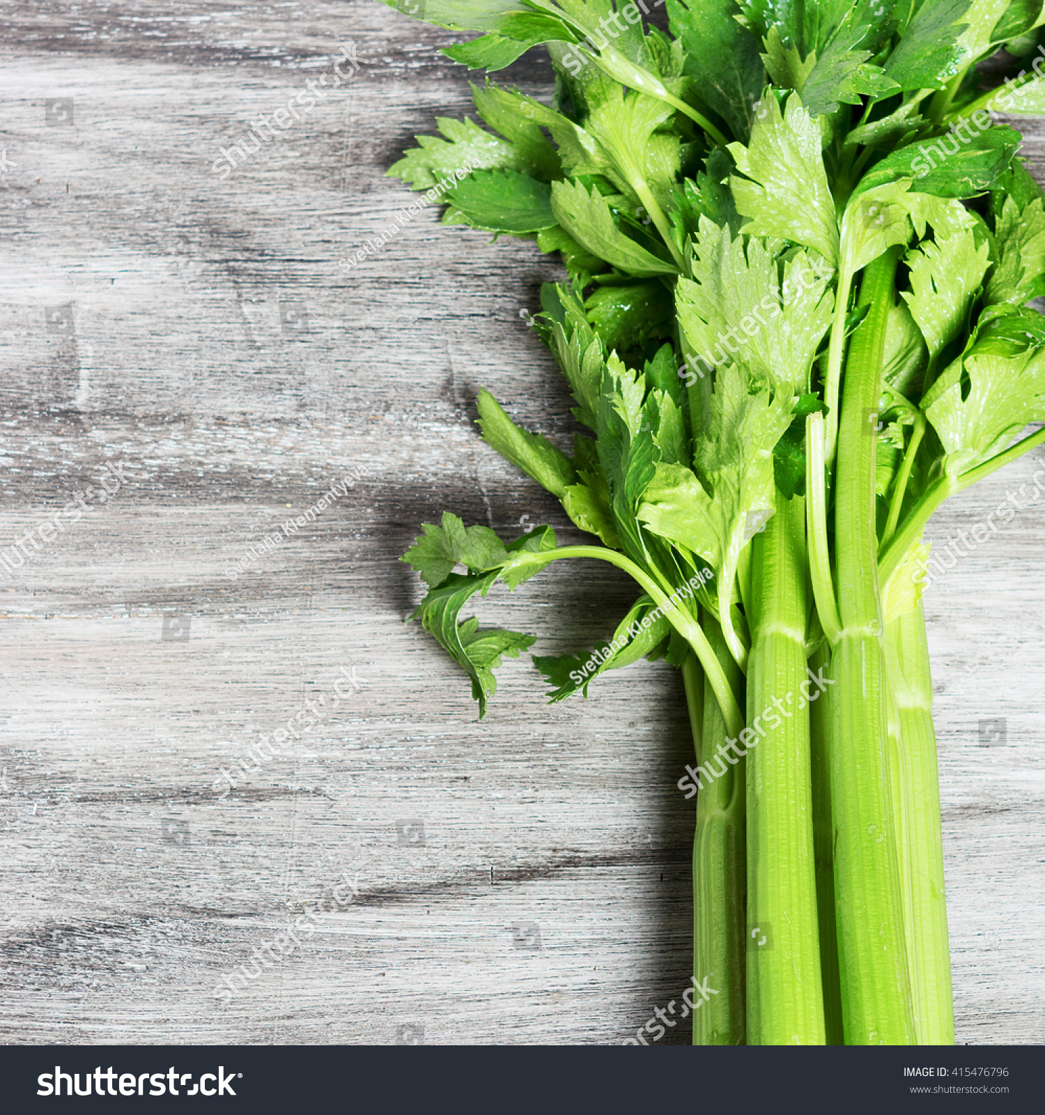 aim Draw a picture Slippery Stem Celery On Grey Wooden Table Stock Photo 415476796 | Shutterstock