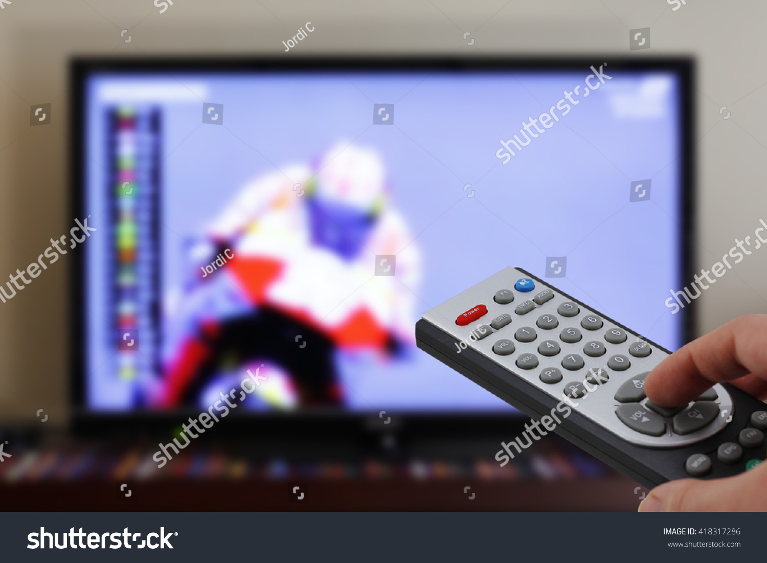 Watching Motorbike Race Television Tv Remote Stock Photo 418317286 ...