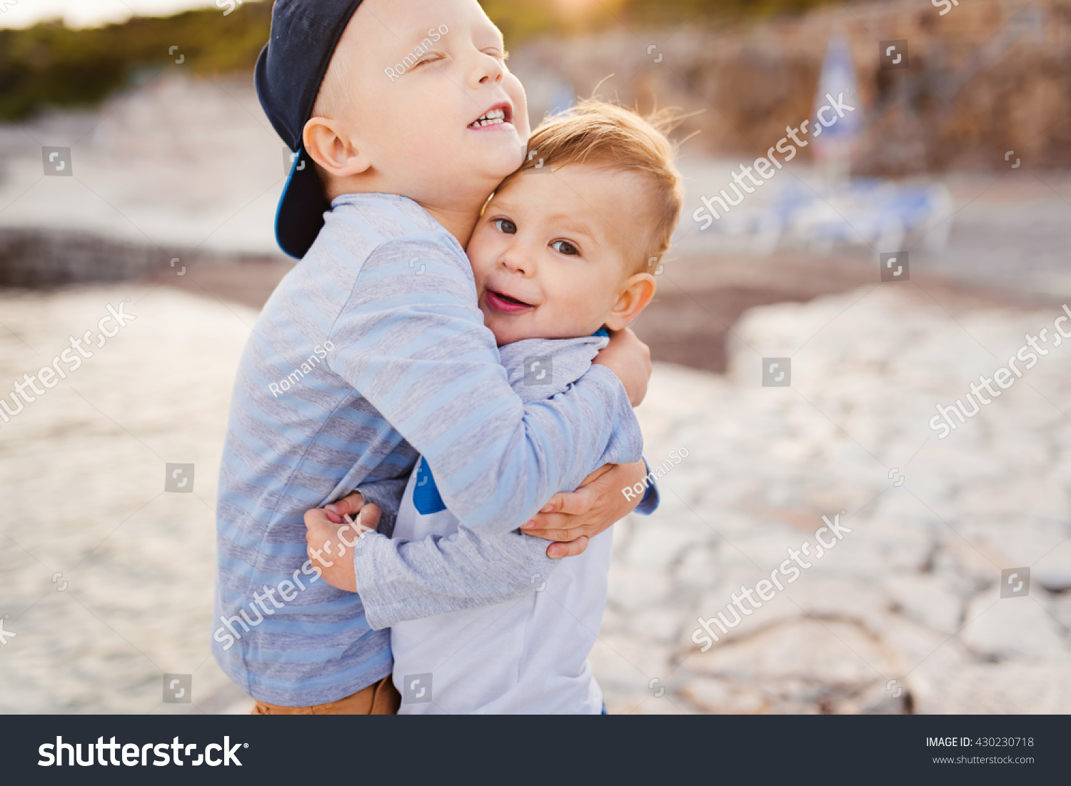 young boys hugging