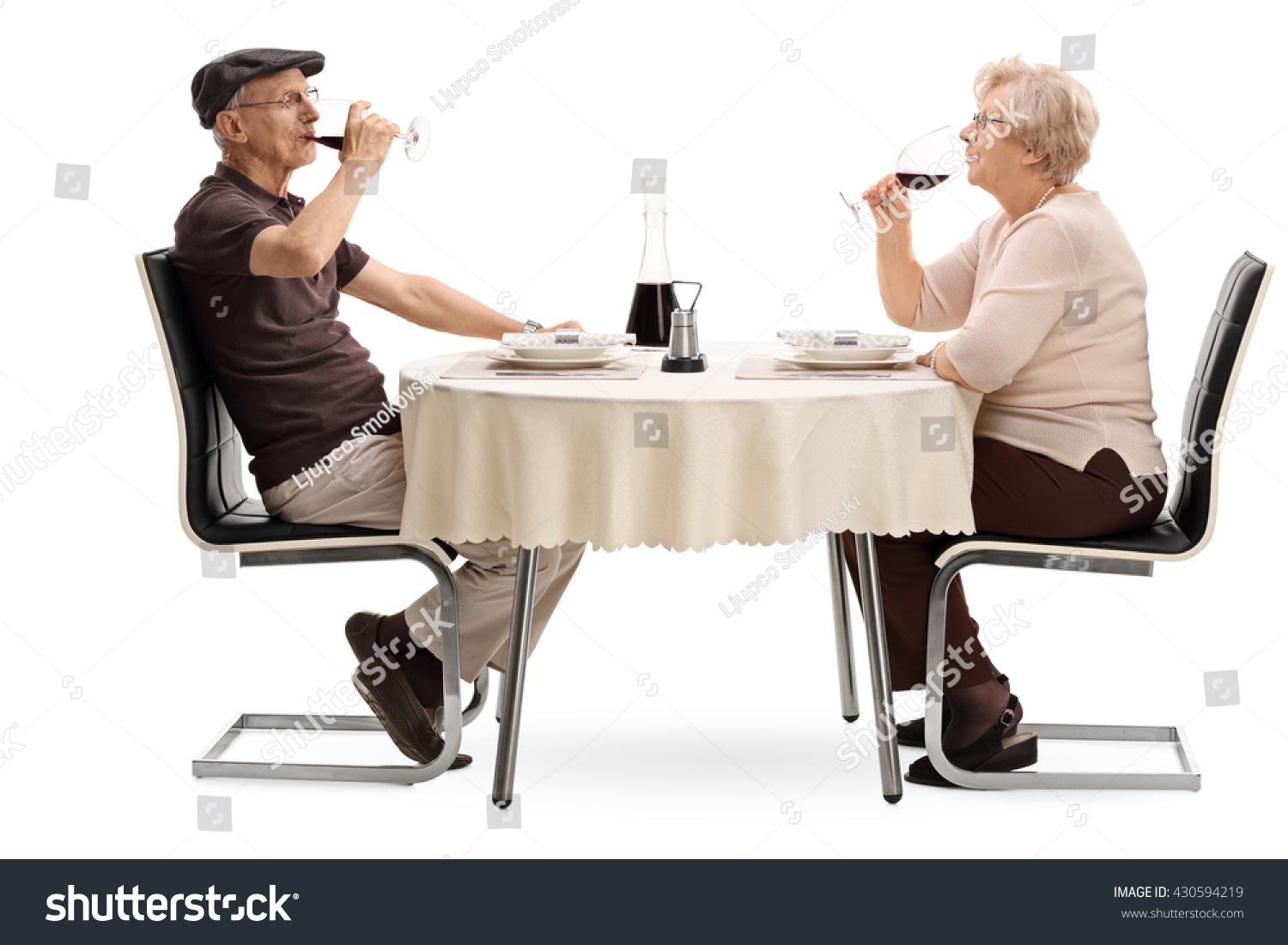 Woman sitting and drinking Wine