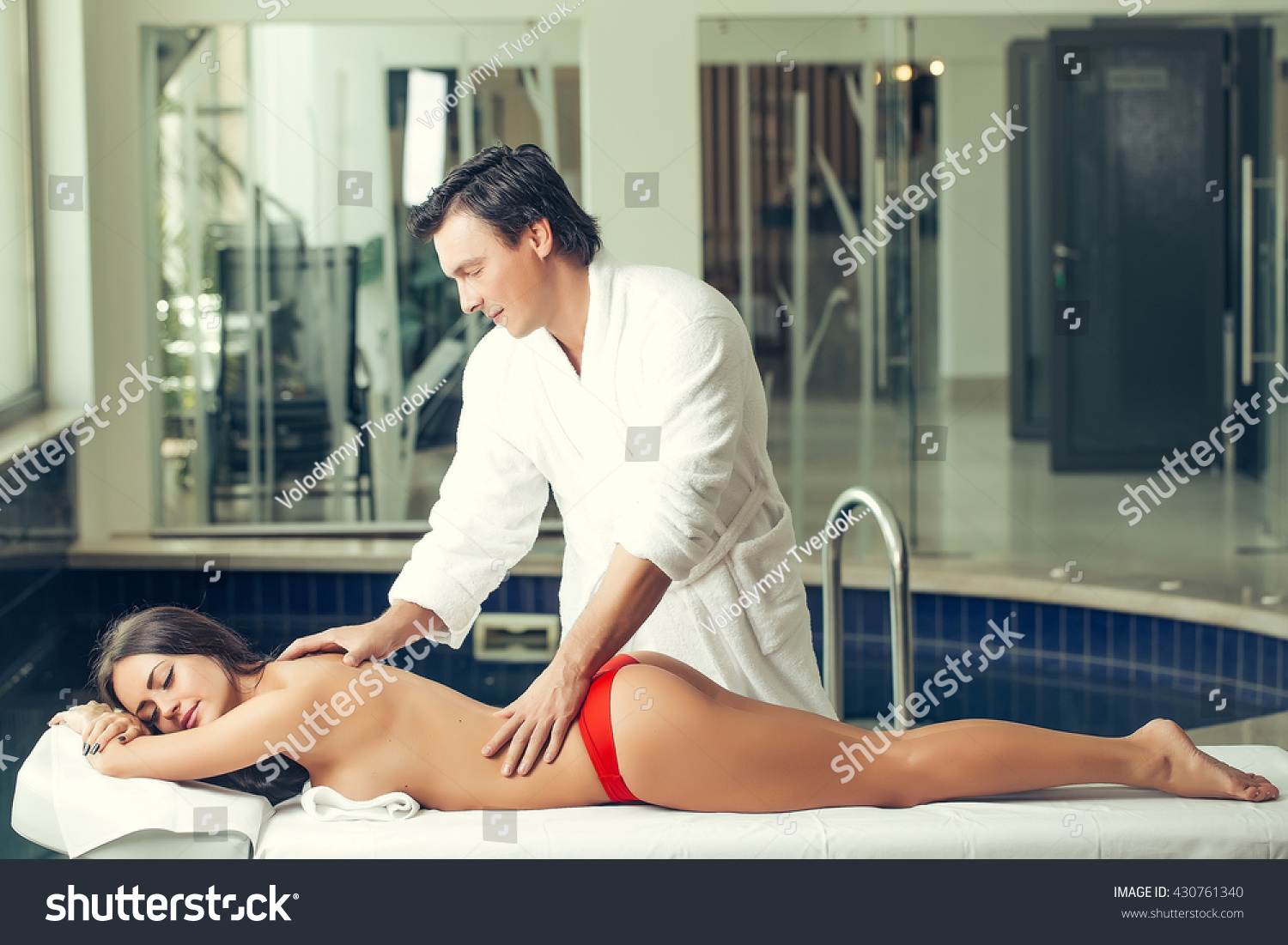 George does a professional massage to a sexy brunette