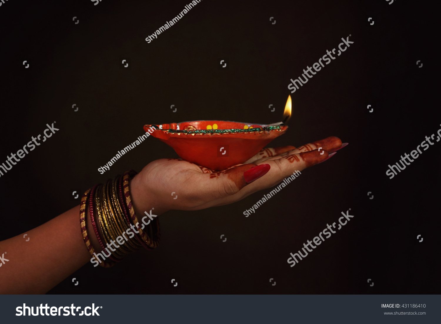 Indian Girls Hand Holding Oil Lamp Stock Photo 431186410 | Shutterstock