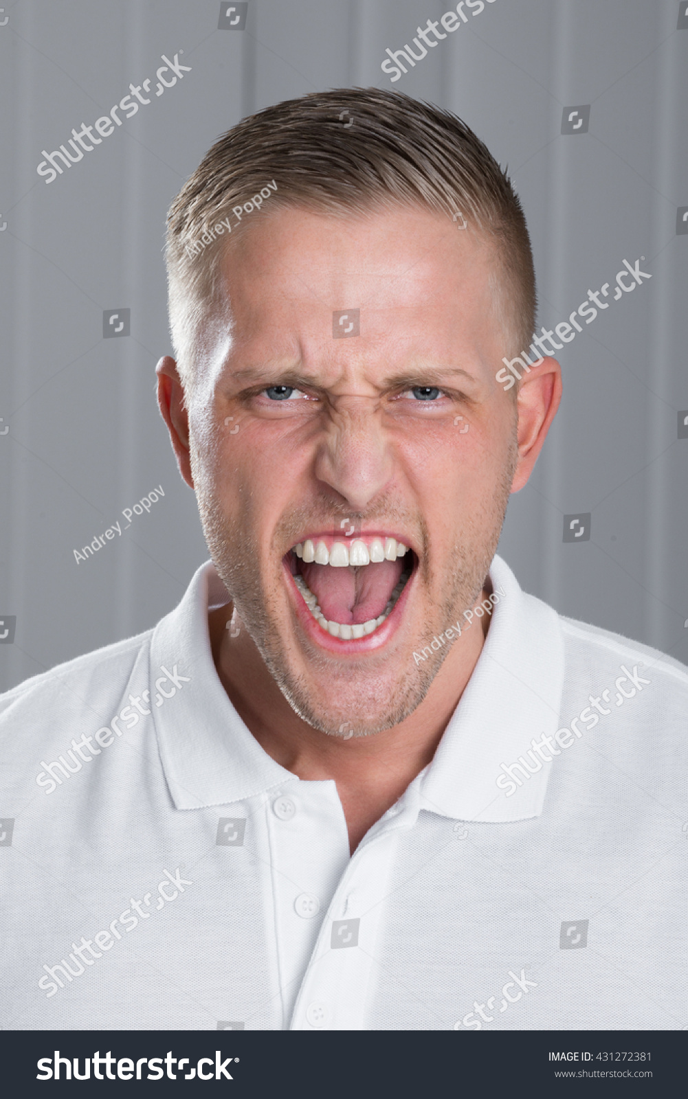 portrait-photo-angry-young-man-screaming-stock-photo-431272381