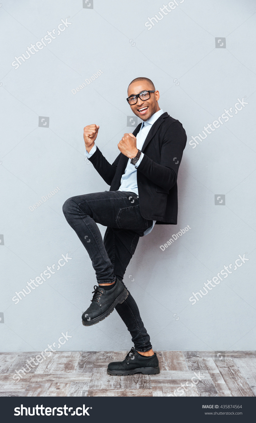 Smiling African American Young Man Standing Stock Photo 435874564 ...