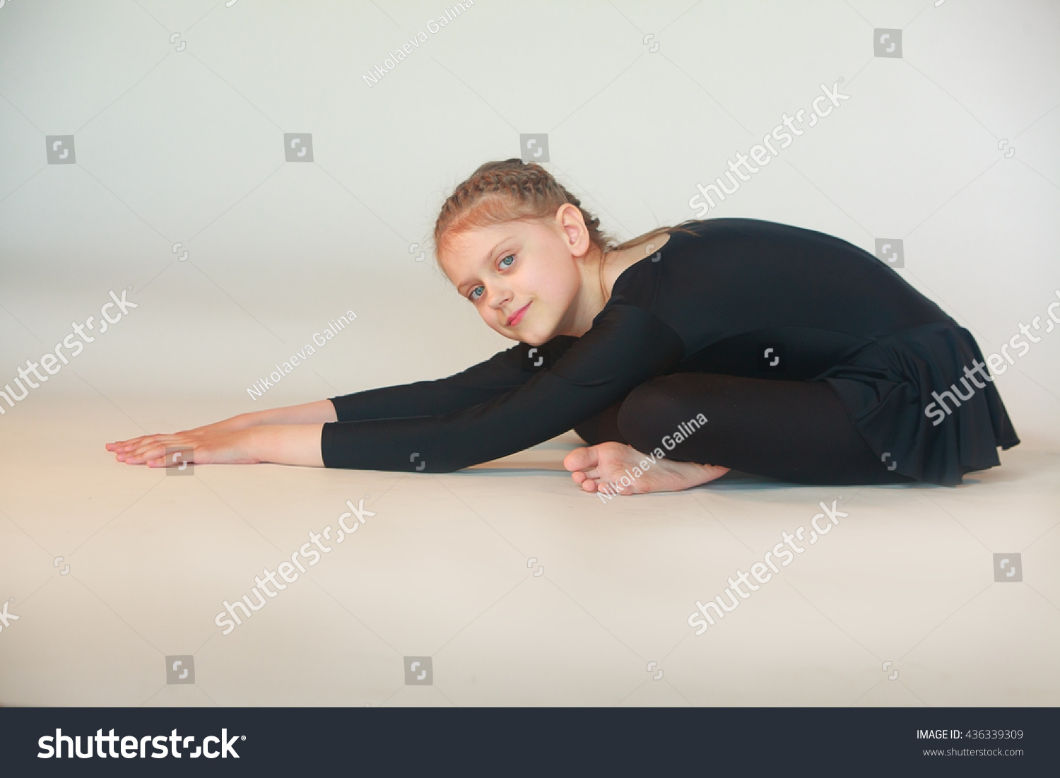 Little Girl Doing Yoga On White Stock Photo 436339309 