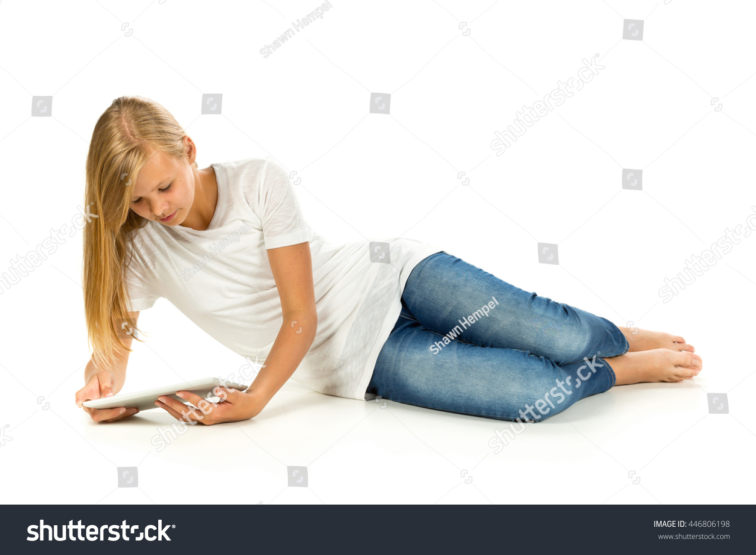 Young Girl Lying On Floor Using Stock Photo 446806198 | Shutterstock