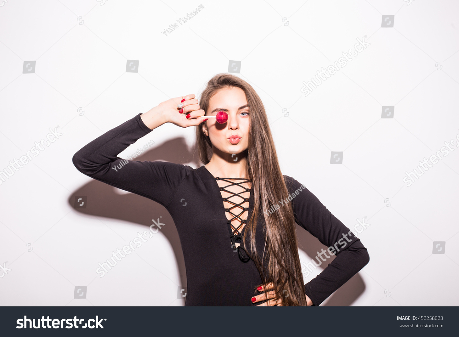 Стоковая фотография 452258023 Sexy Woman Lollipop Looking Back Camera Shutterstock 5214