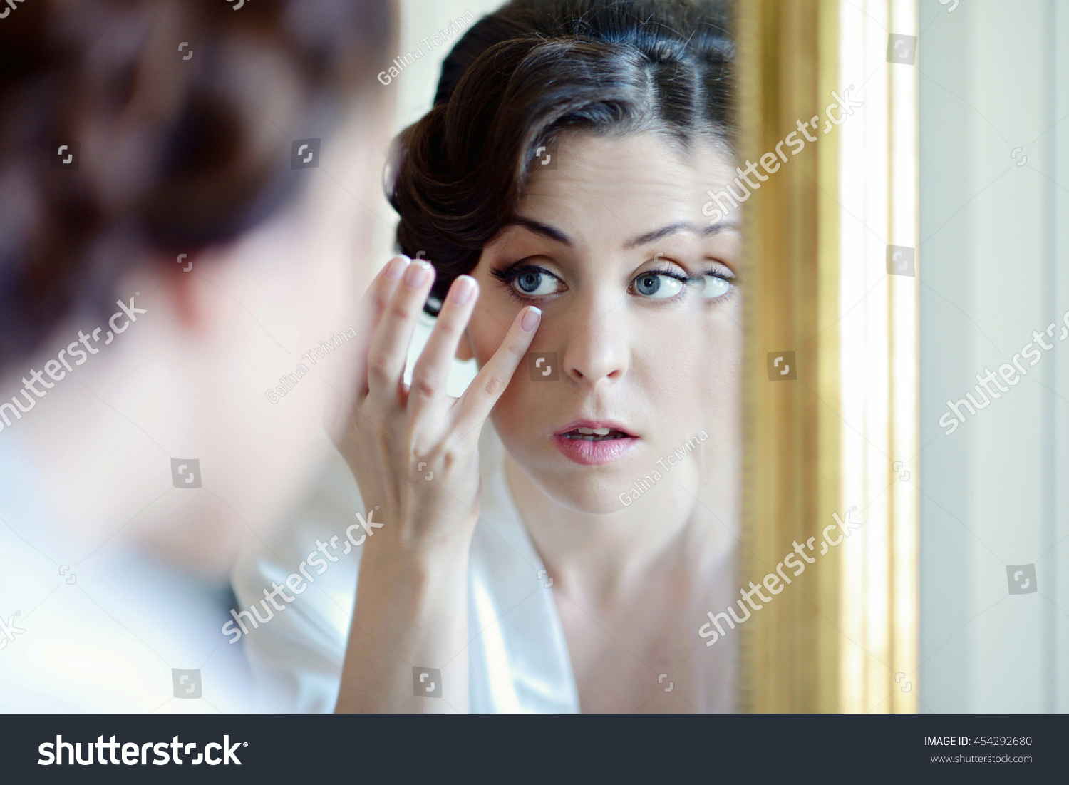 beauty-bride-dressing-gown-bridal-makeup-stock-photo-454292680