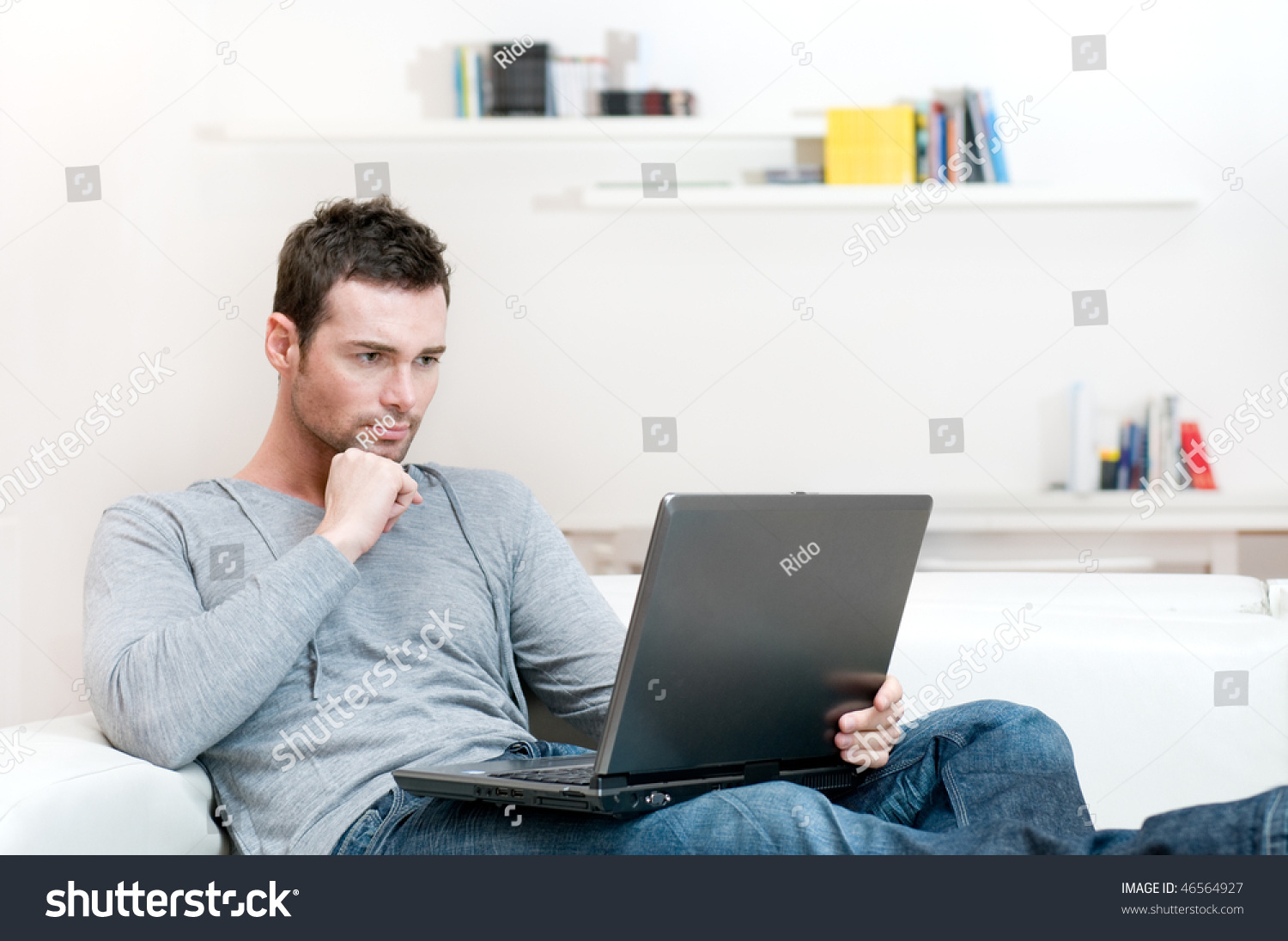 Young Man Working Absorbed On Laptop Stock Photo 46564927 | Shutterstock