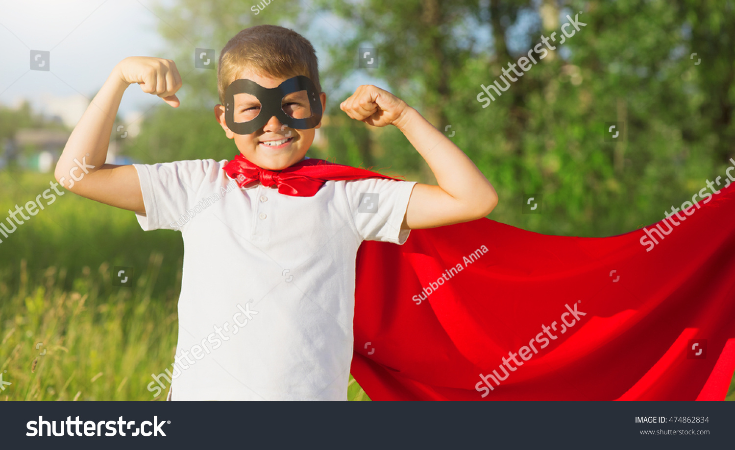 Superhero Kid Showing His Muscles Over Stock Photo 474862834 | Shutterstock