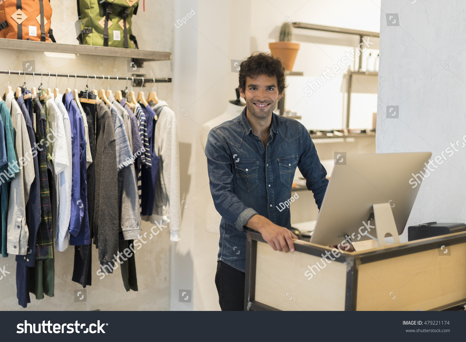 Cheerful Seller Man Clothing Store Working Stock Photo 479221174 ...