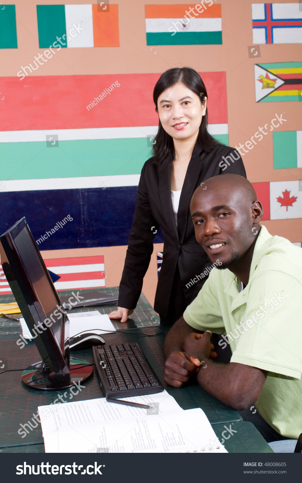 Female Chinese Teacher Teaching Computer African Stock Photo 48008605 ...