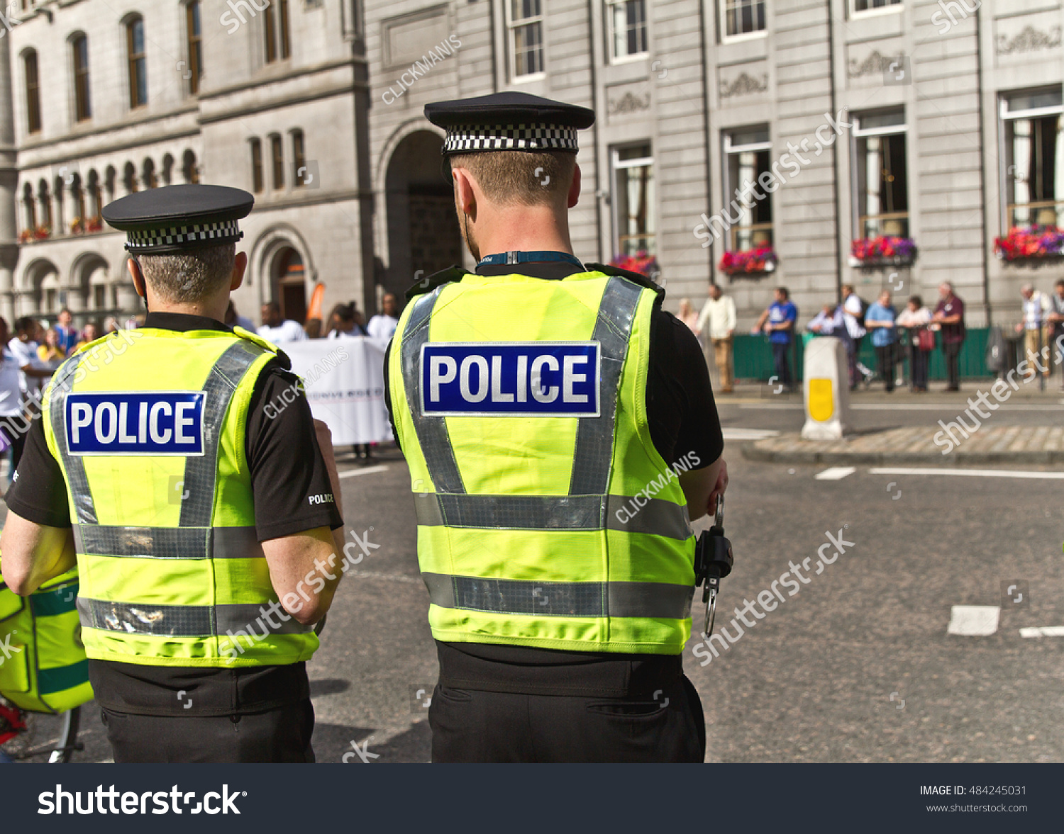 Two Police Officers Uniform Watching Crowd Stock Photo 484245031 ...