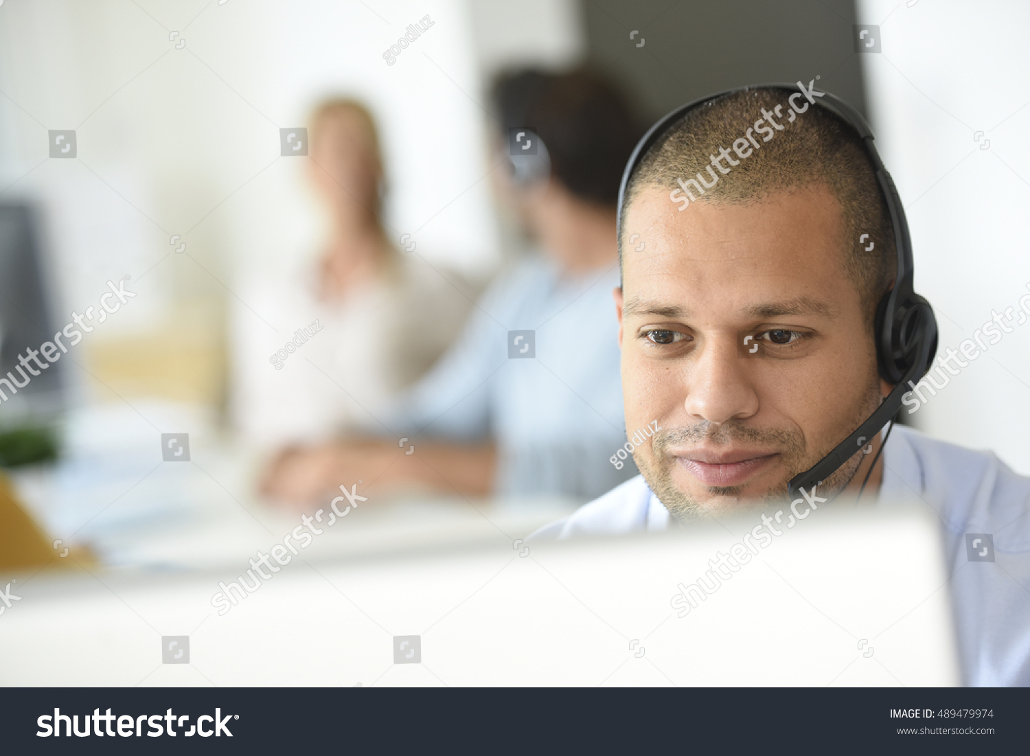 customer-service-operator-working-office-stock-photo-489479974