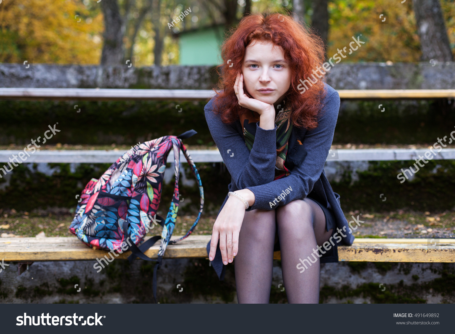 Sad Woman Sitting On Bench Image