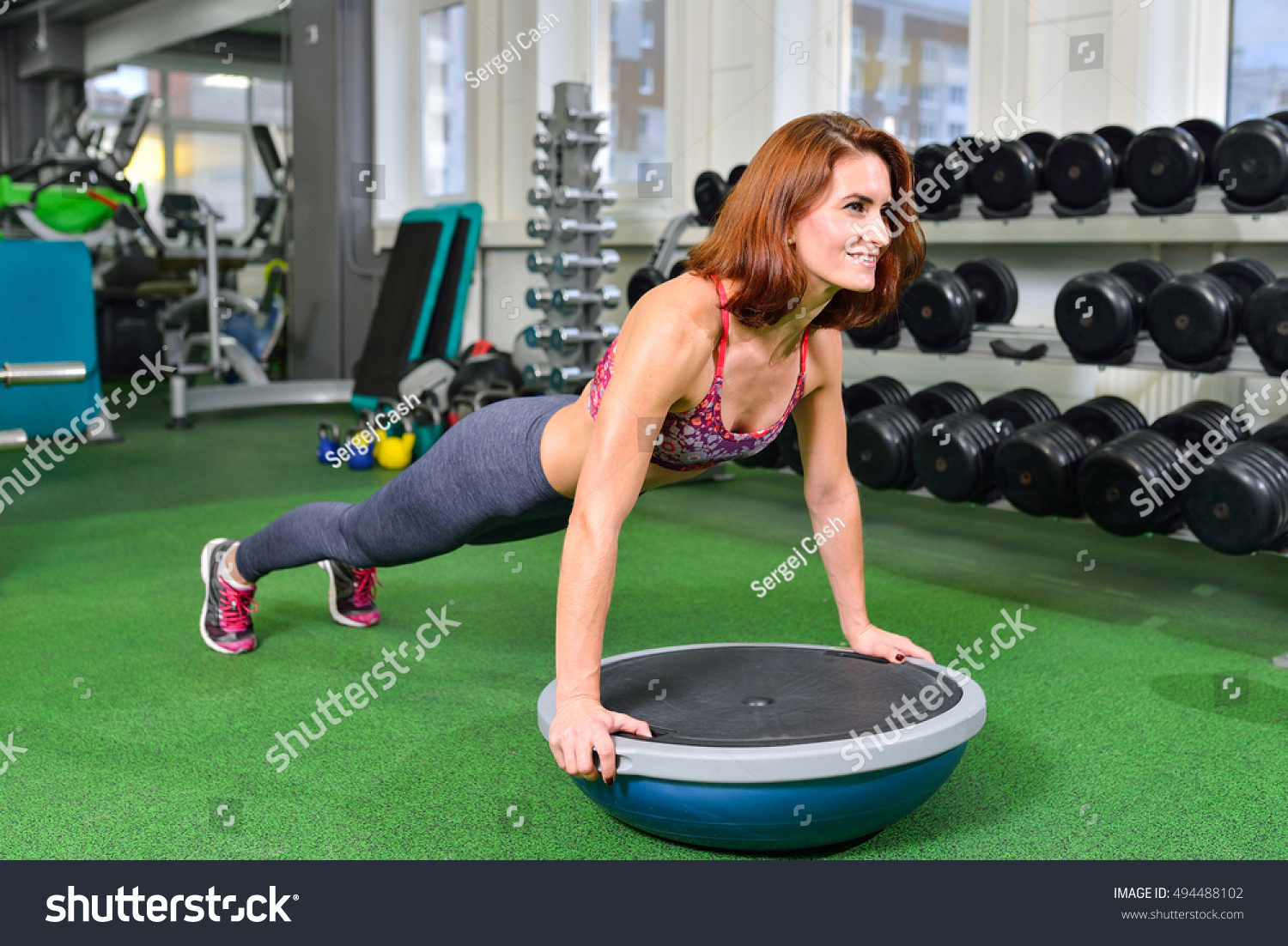 fitness-woman-planking-doing-body-weight-stock-photo-494488102