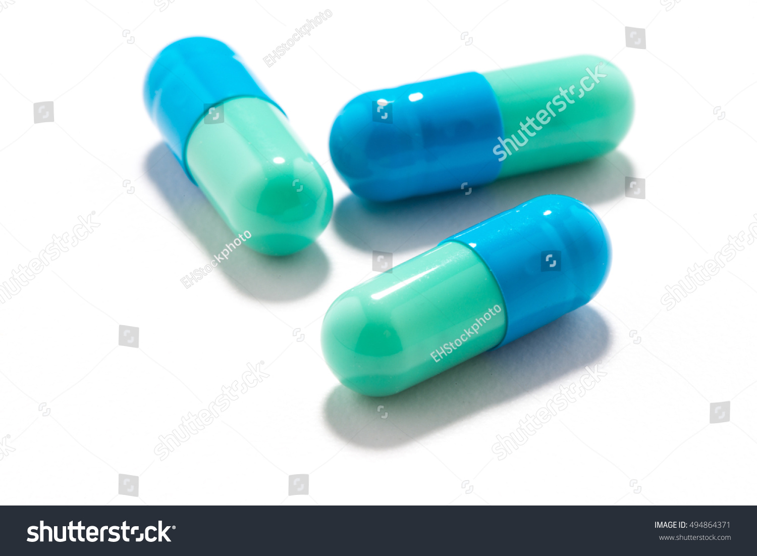 Зеленые антибиотики. Голубые капсулы ib1. Зелено синие таблетки капсулы. Синяя таблетка капсула. Зеленые капсулы.