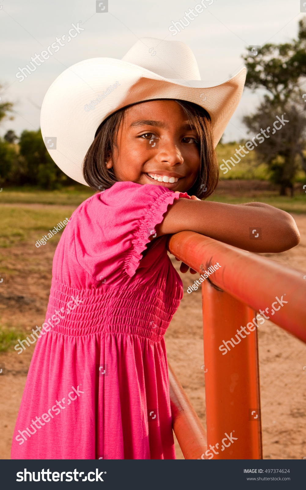 little-girl-wearing-cowboy-hat-on-stock-photo-497374624-shutterstock