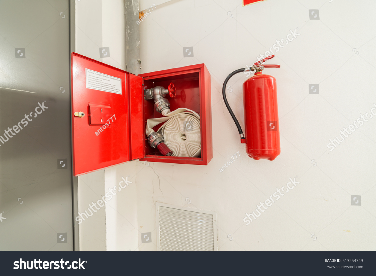 Hydrant Fire Extinguisher Hanging On Wall Stock Photo 513254749 ...