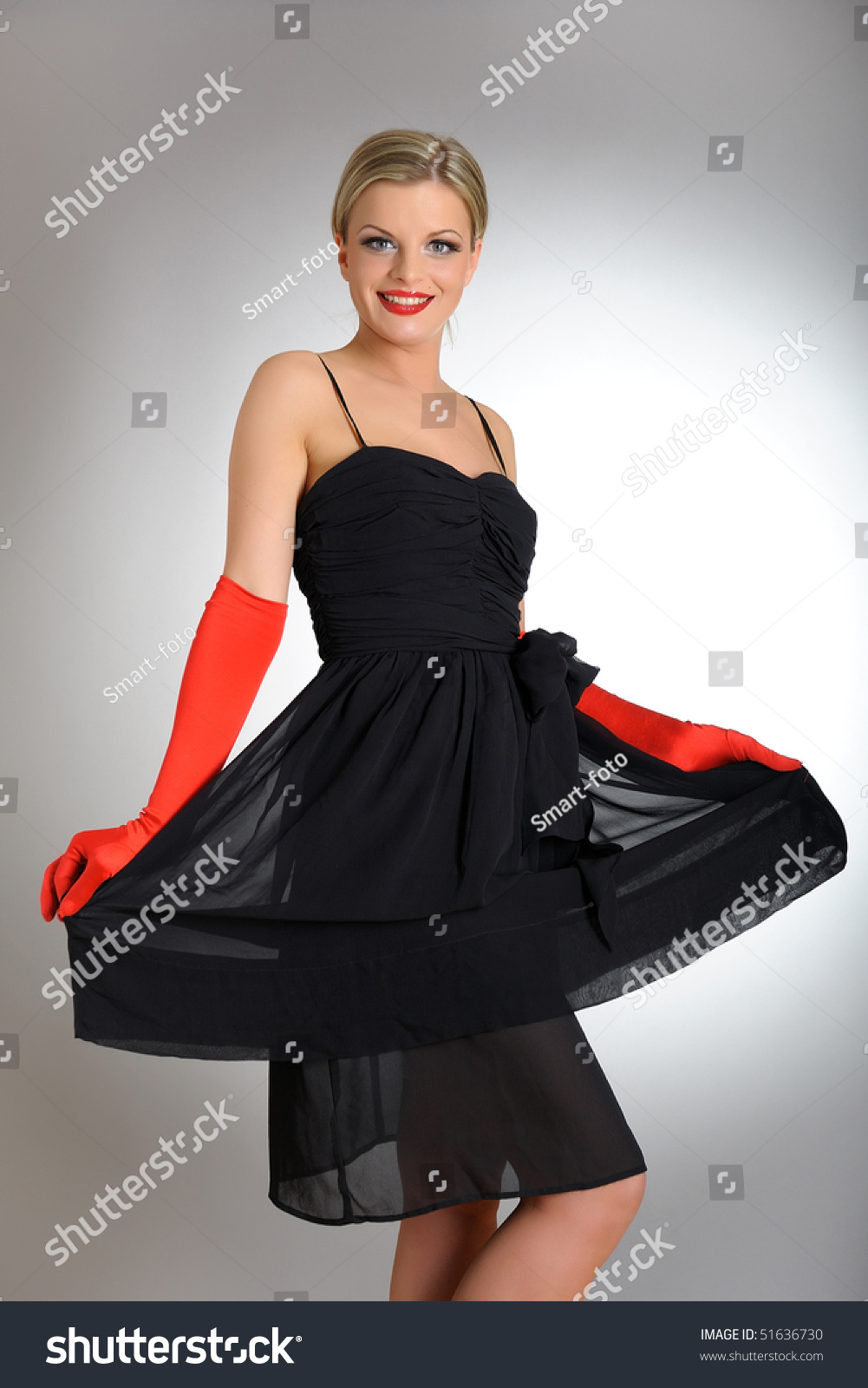 black dress with red gloves