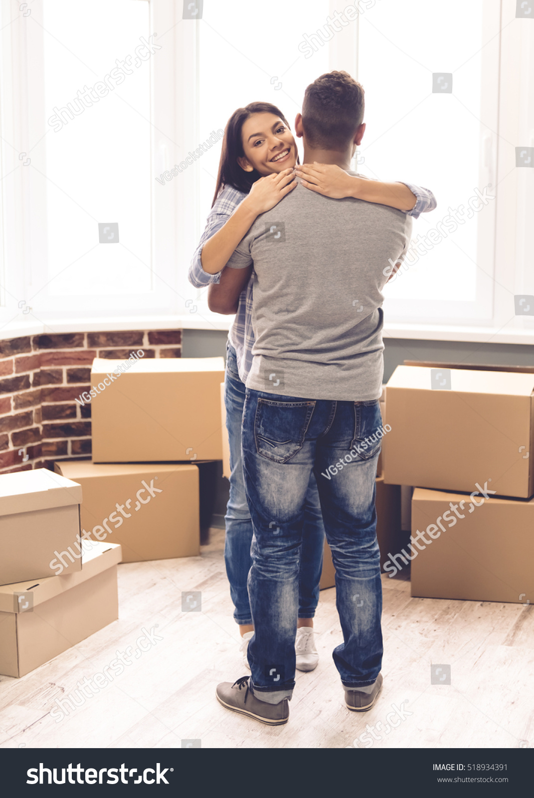 Beautiful Young Couple Hugging Smiling While库存照片518934391 Shutterstock