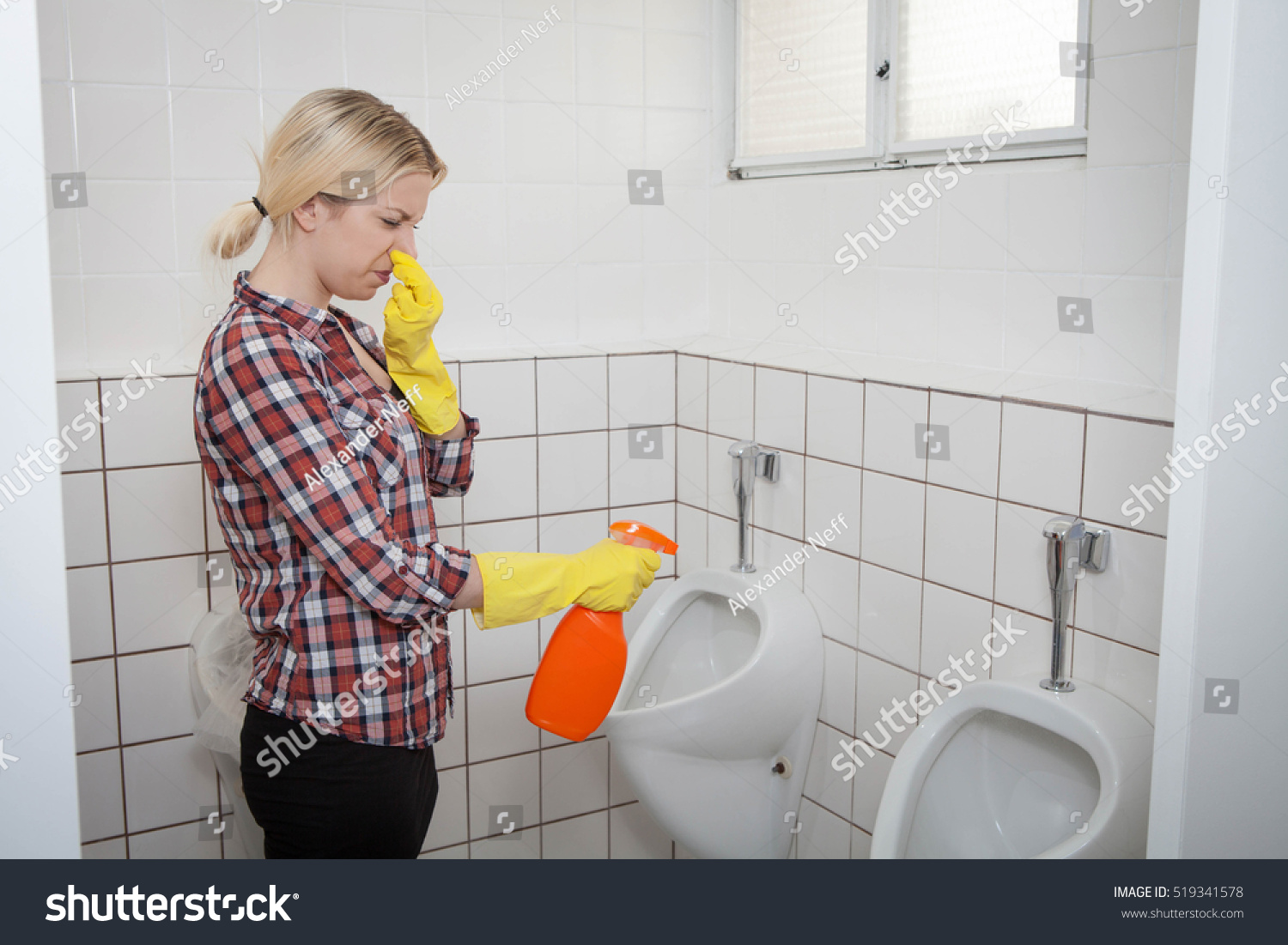 rubber gloves cleaning toilet