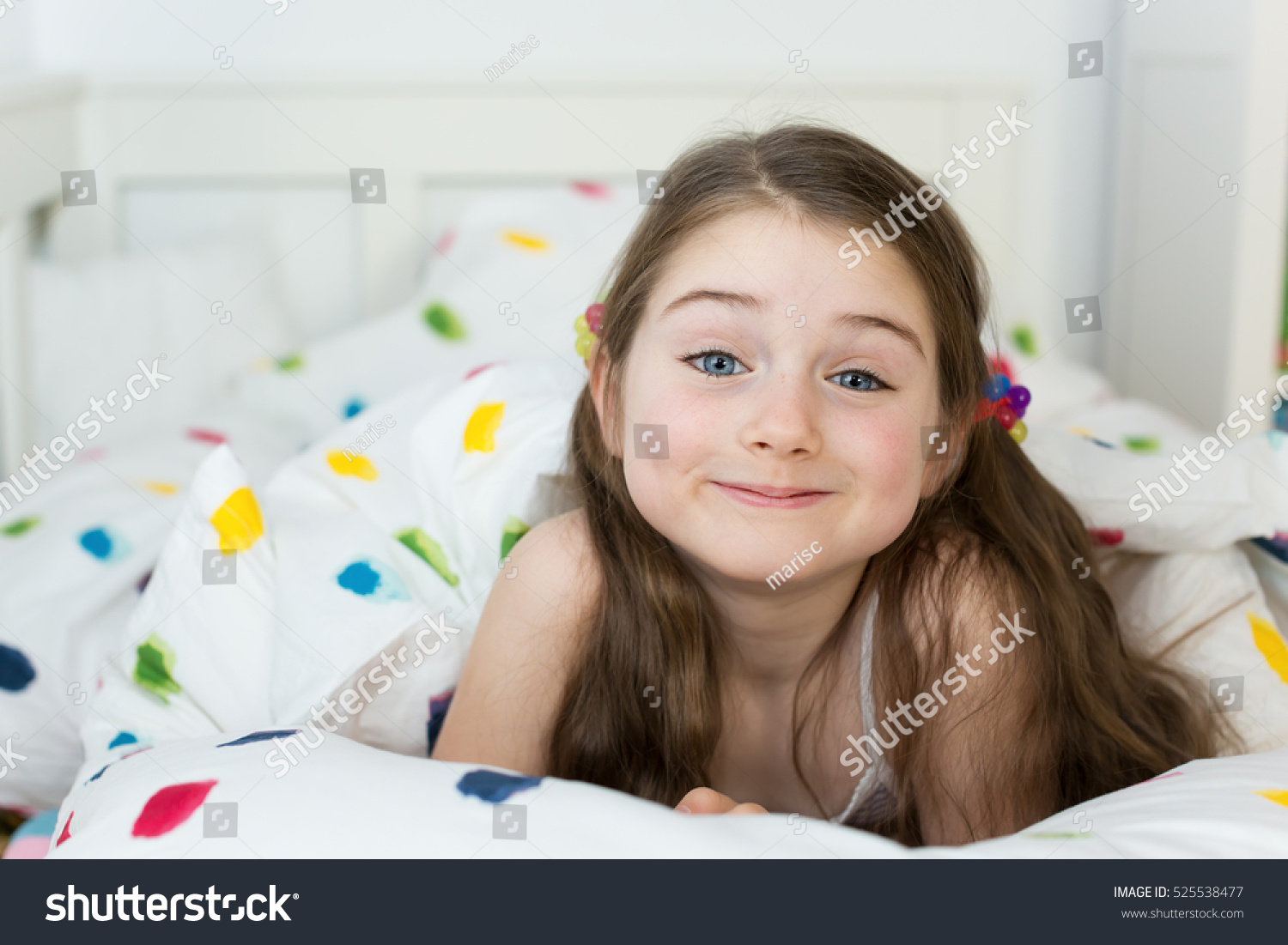 portrait-happy-smiling-little-girl-morning-stock-photo-525538477