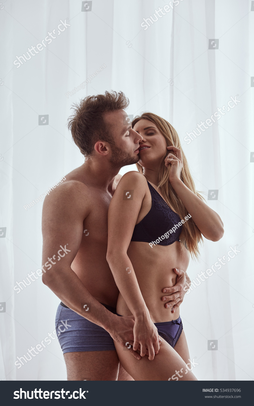 Erotic Couple Kissing During Foreplay Standing Stock Photo Shutterstock