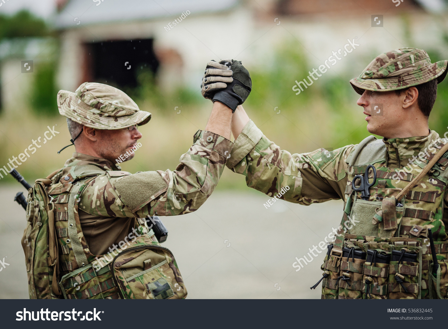 Soldier Shaking Hands On Outdoor Stock Photo | Adobe Stock