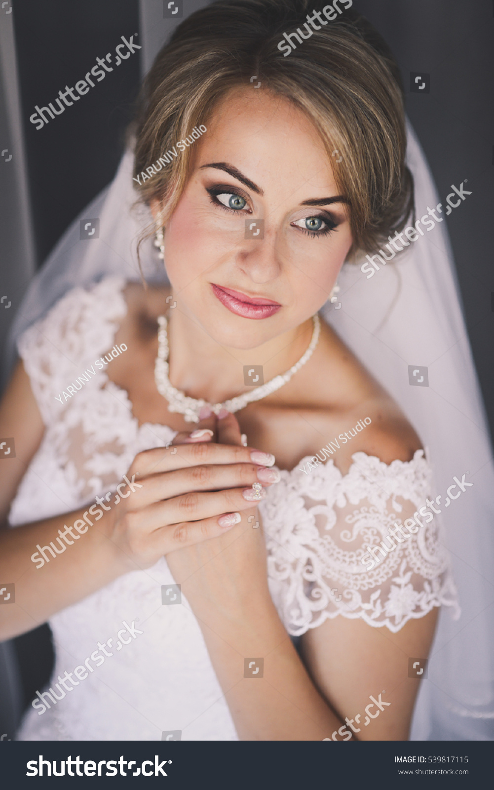 portrait-bride-white-wedding-dress-by-stock-photo-539817115-shutterstock