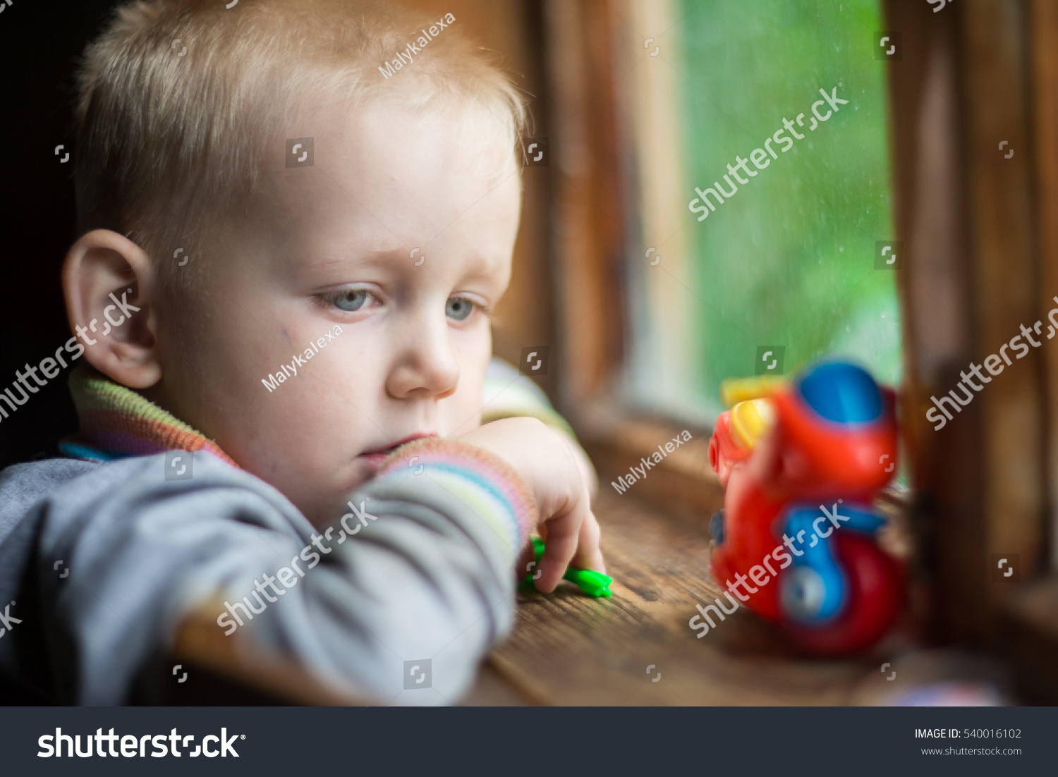 sad-child-little-boy-window-foto-stok-540016102-shutterstock