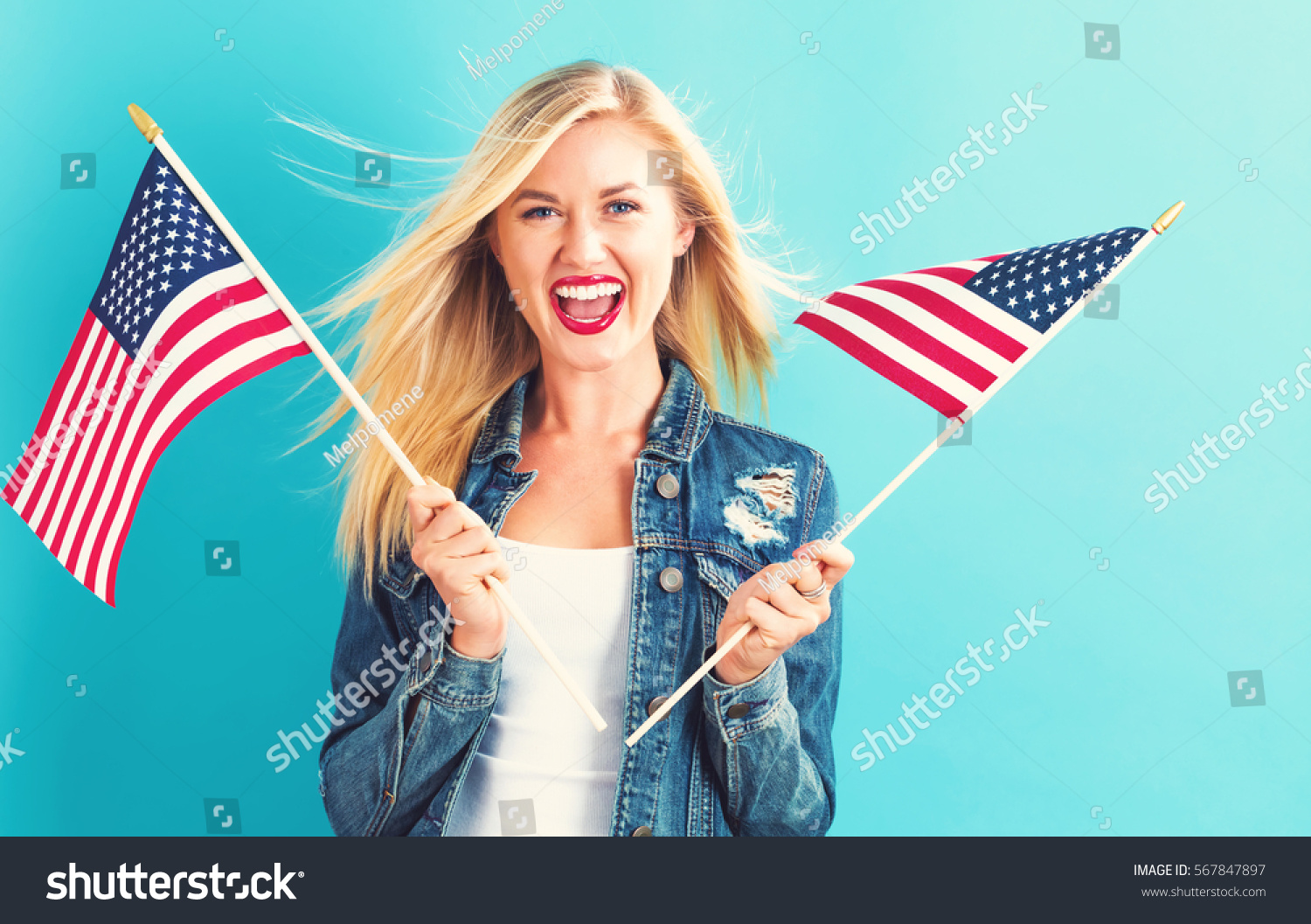 Happy Young Woman Holding American Flag Stock Photo 567847897 ...