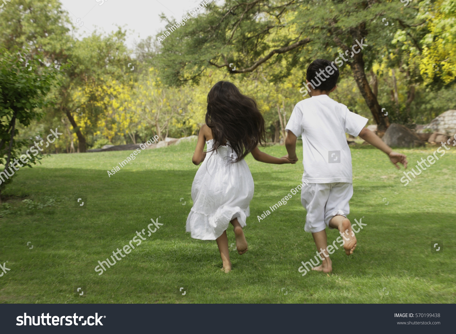 Two Little Children Running Away Stock Photo 570199438 | Shutterstock